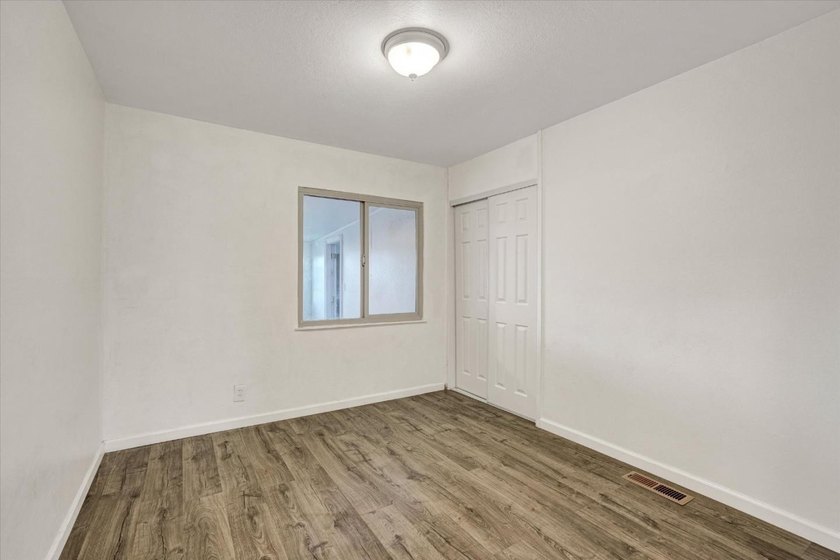 This 3-bedroom, 2-bath home offers 1,215 square feet of - photo 17