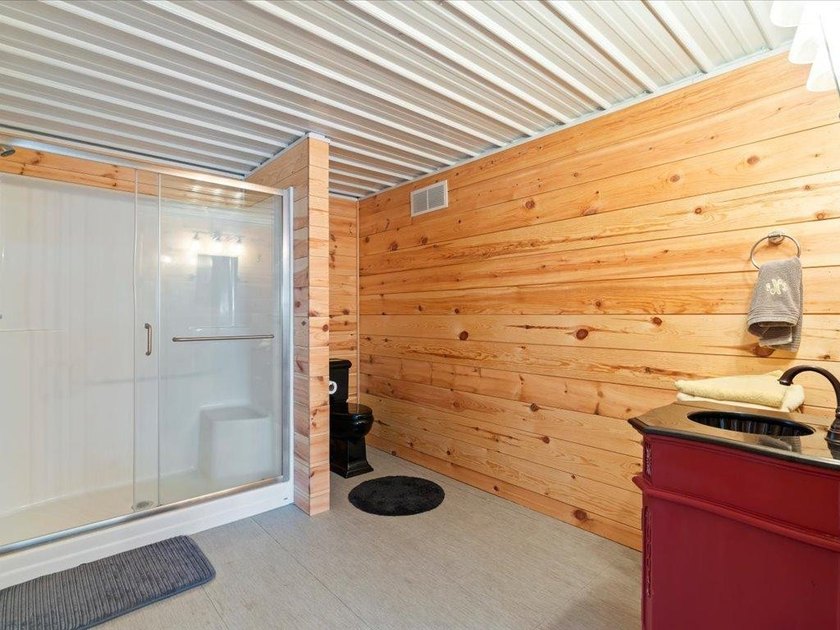 County Home on 12.54 Acres! This versatile property offers - photo 29