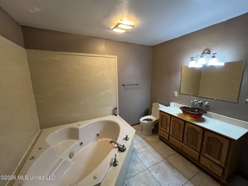 Large waterfront home with multiple living areas, great spot for - photo 3