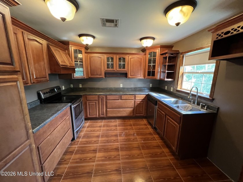 Large waterfront home with multiple living areas, great spot for - photo 6