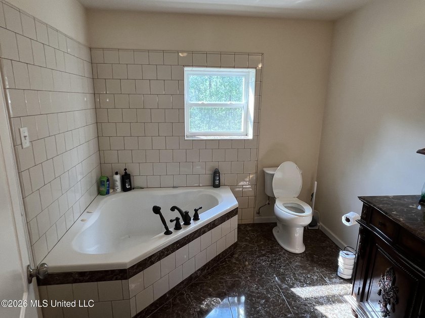 Two level home facing water front canal, fish from your backyard - photo 7