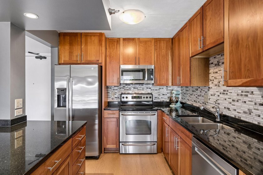 Enjoy sunny South-facing skyline views from this beautifully - photo 12