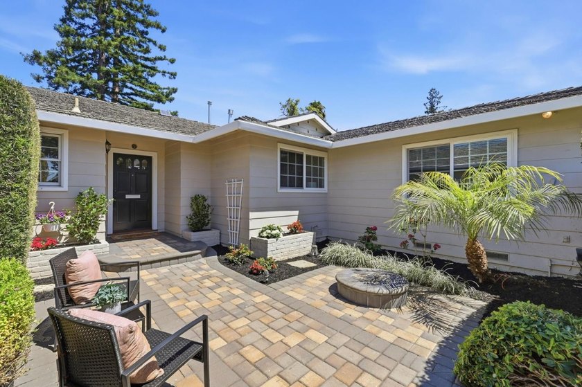 Welcome to this beautifully refreshed ranch-style home in the - photo 3