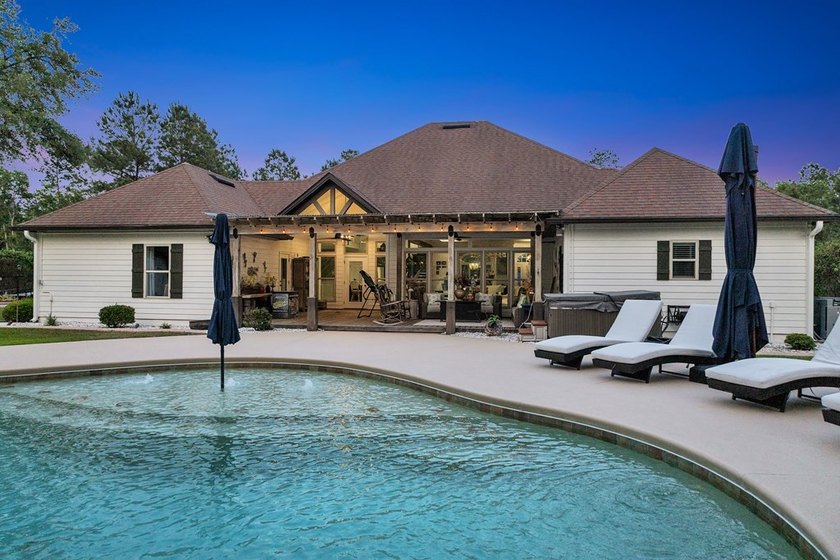 Situated on nearly 5 private acres, this exceptional estate - photo 7