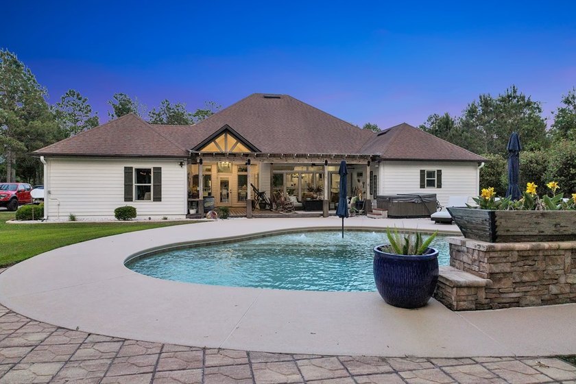 Situated on nearly 5 private acres, this exceptional estate - photo 8