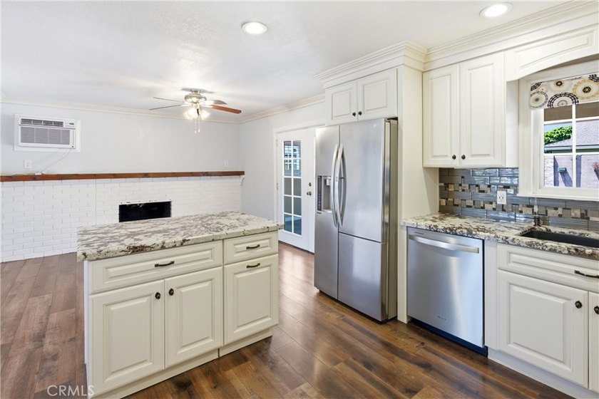 WOW! This beautifully maintained 3-bedroom, 2-bathroom home is - photo 14