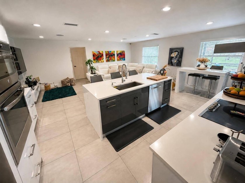 REMODELED 3-bedroom, 2-bath lakefront POOL home on 9500+ sq ft - photo 9