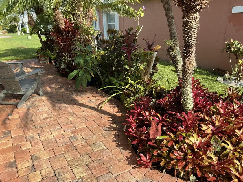 This unique Home in the Palm Grove community stand out with - photo 5