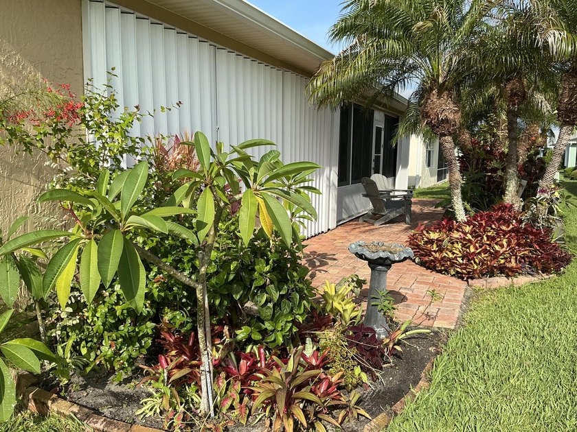 This unique Home in the Palm Grove community stand out with - photo 7