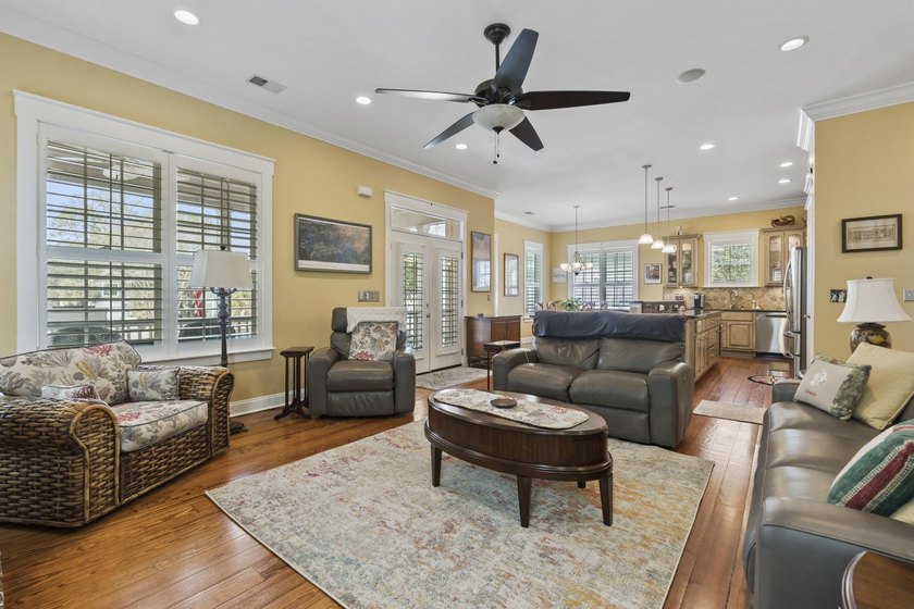 Four-bedroom, three-bathroom, elevated coastal home with a - photo 14