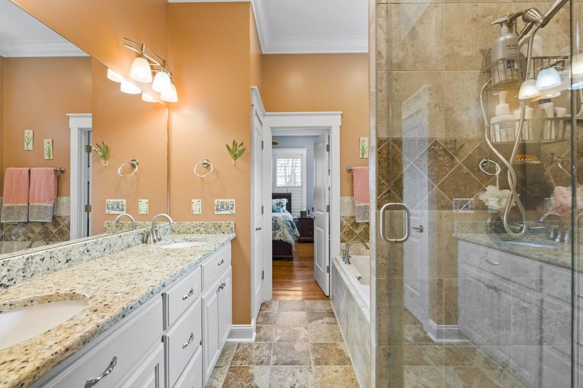 Four-bedroom, three-bathroom, elevated coastal home with a - photo 18