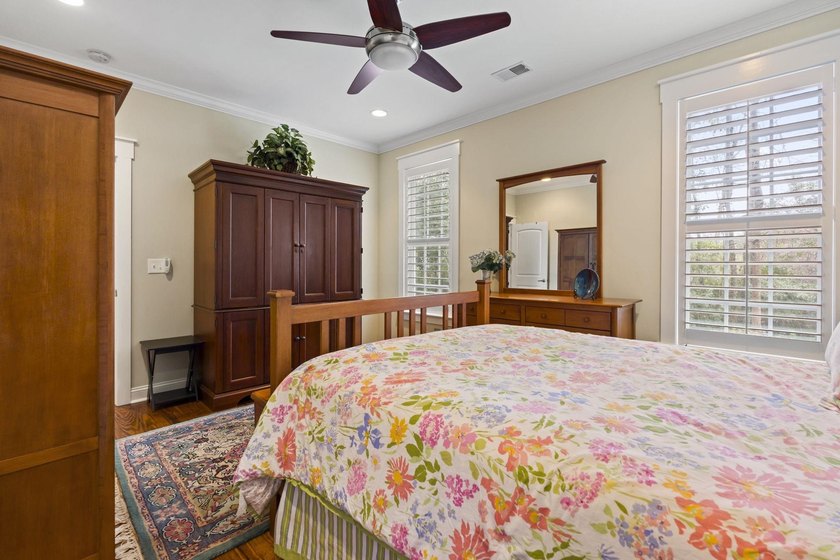 Four-bedroom, three-bathroom, elevated coastal home with a - photo 24