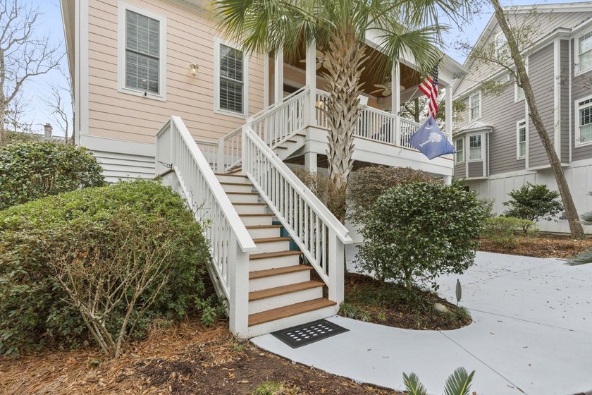 Four-bedroom, three-bathroom, elevated coastal home with a - photo 37