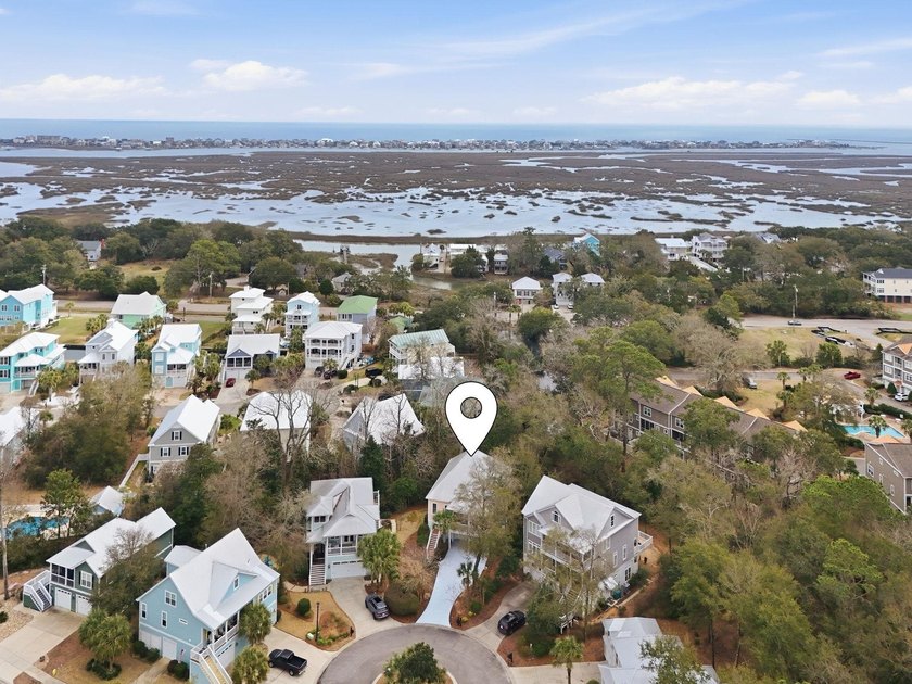 Four-bedroom, three-bathroom, elevated coastal home with a - photo 42
