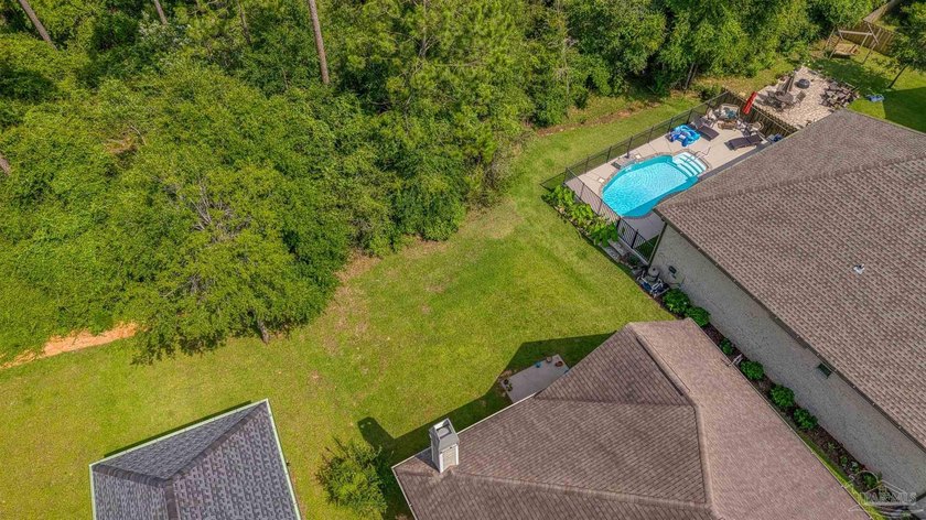 Discover this beautifully maintained home in Nature Trail. Backs - photo 43
