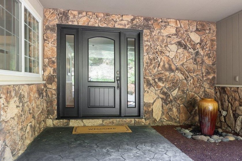 Nicely tucked back on approximately 2.8 peaceful acres in the - photo 4