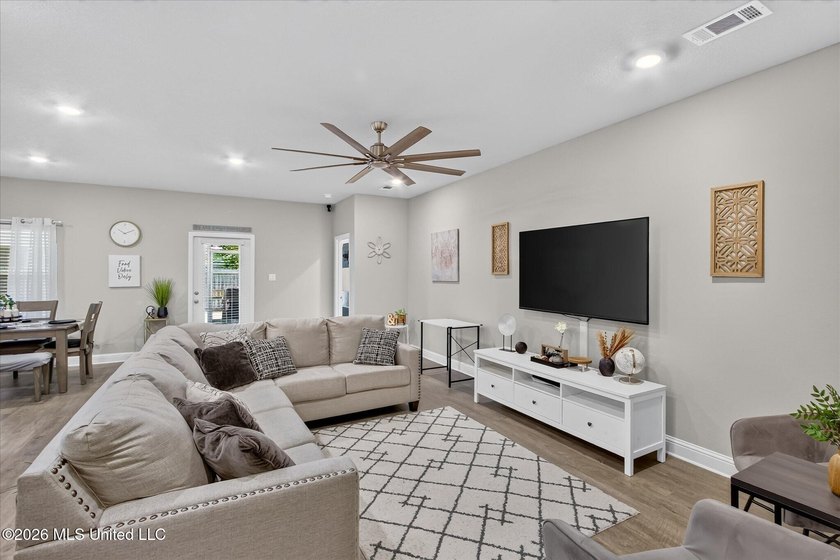 Some homes you tour. This one you settle into. The open layout - photo 9