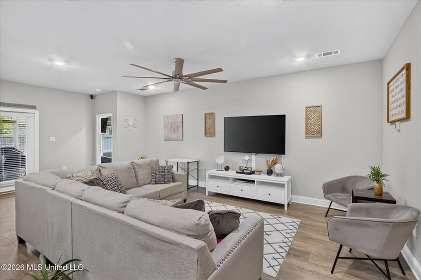 Some homes you tour. This one you settle into. The open layout - photo 10
