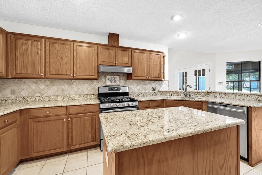 Rarely available in Niceville, this single-level pool and spa - photo 16