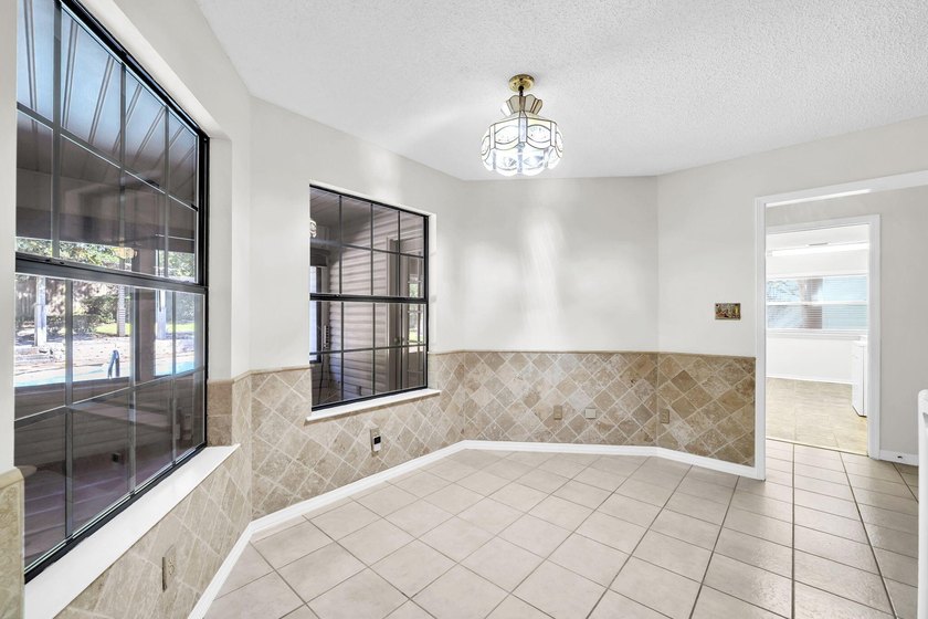 Rarely available in Niceville, this single-level pool and spa - photo 19