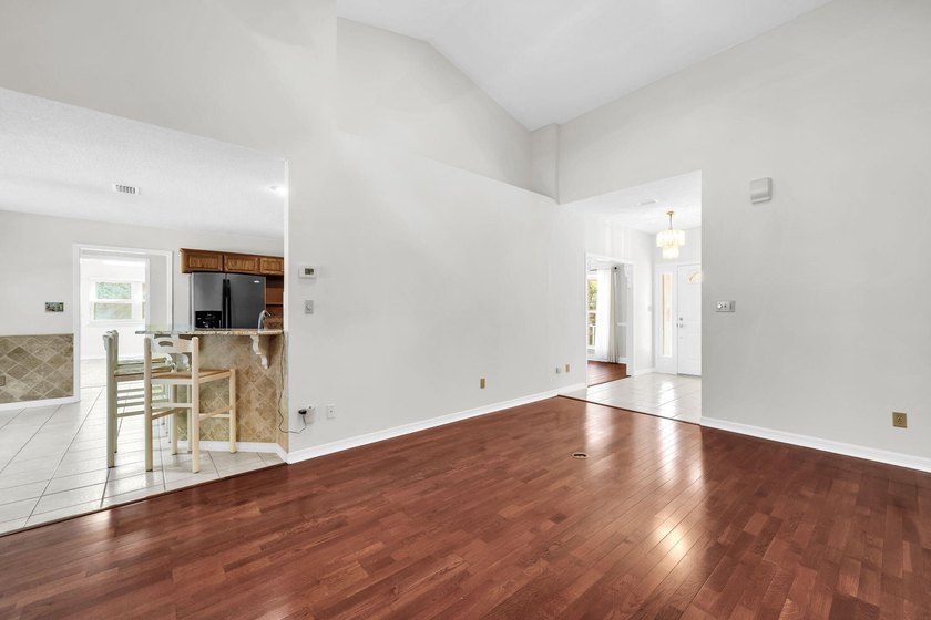 Rarely available in Niceville, this single-level pool and spa - photo 24