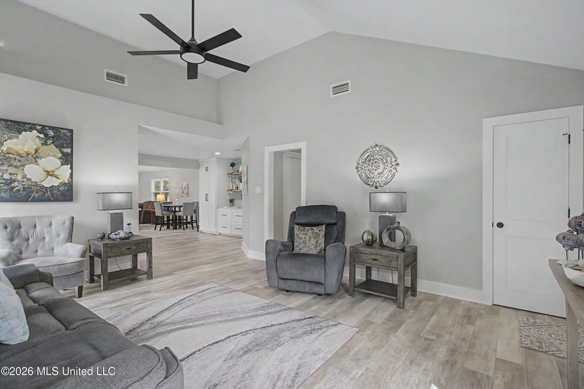 Ocean Springs Gem on a Beautiful Half-Acre Lot! Nestled on a - photo 4