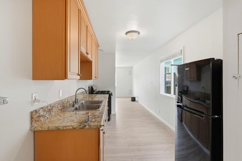 This turn-key Oakland duplex is a premier opportunity for - photo 7