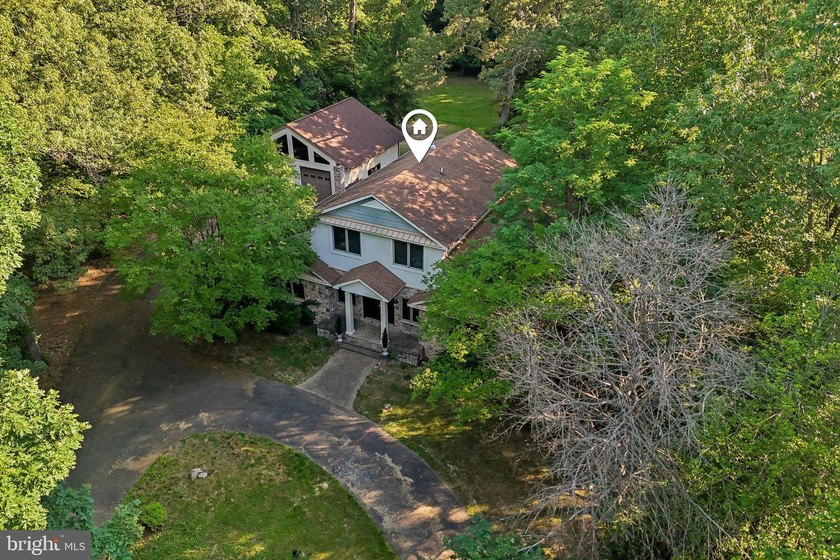 Nestled on a breathtaking 12+ acre picturesque setting just - photo 4