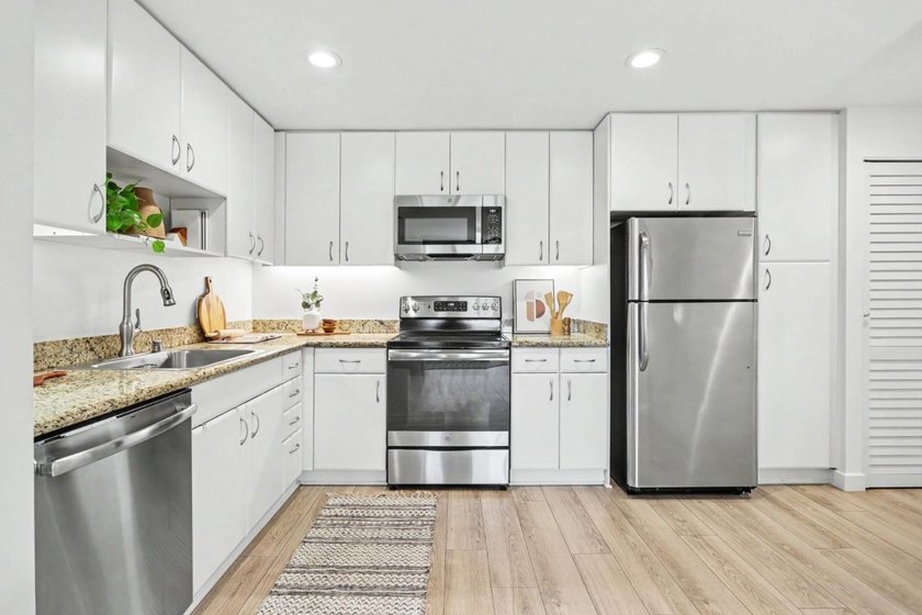 Experience modern city living at its finest in this sleek - photo 8
