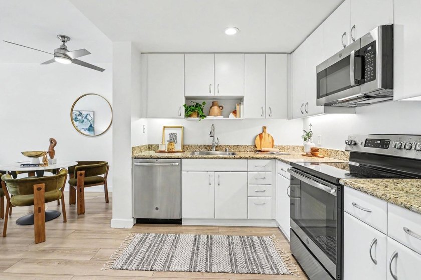 Experience modern city living at its finest in this sleek - photo 9