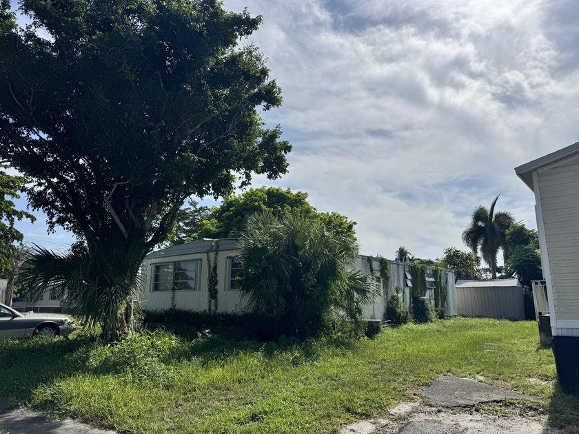 Investor/Handyman/Tear Down Special sold AS-IS in Boca Raton! - photo 2