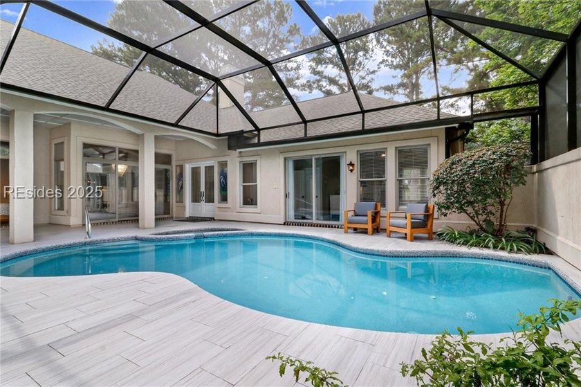 Move-in ready with a recently refinished pool. This beautifully - photo 2