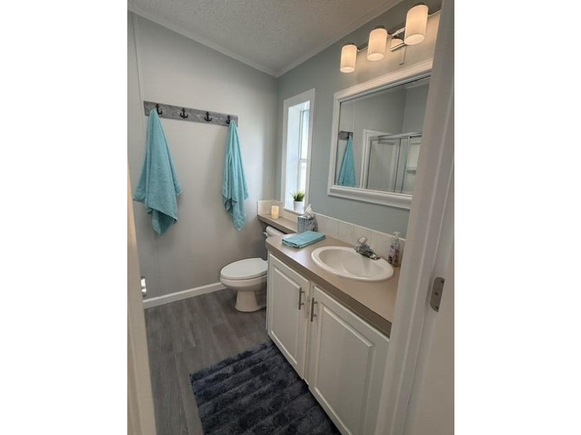 Welcome to this charming 2-bedroom, 2-bathroom residence located - photo 6