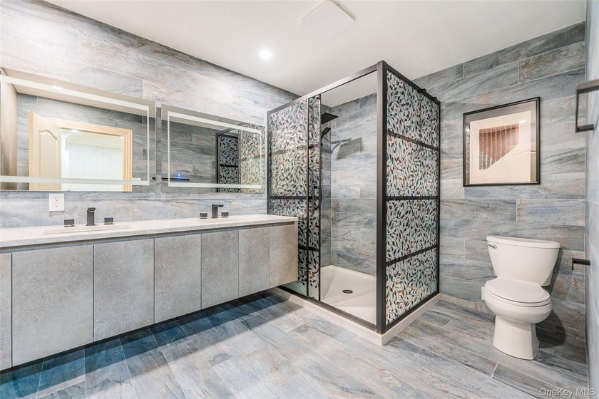 Welcome to this elegant gated condominium in the highly - photo 13