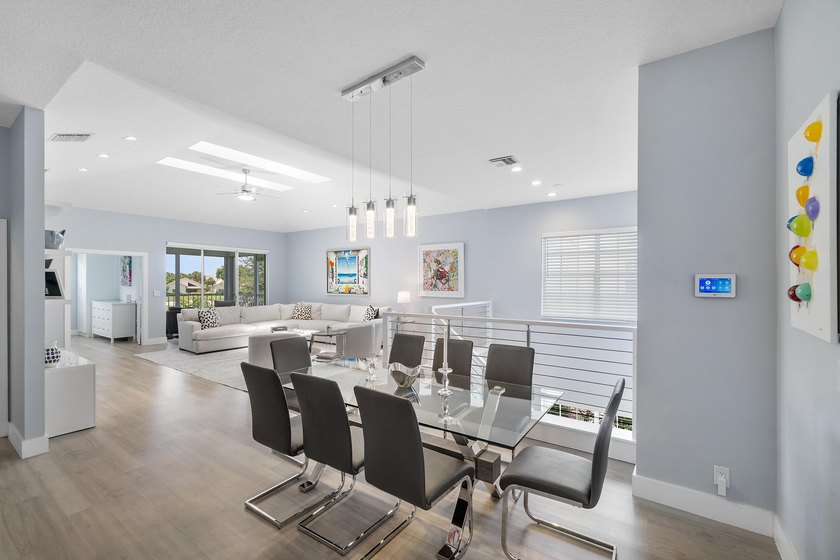 Light, open, and thoughtfully updated, this penthouse residence - photo 8