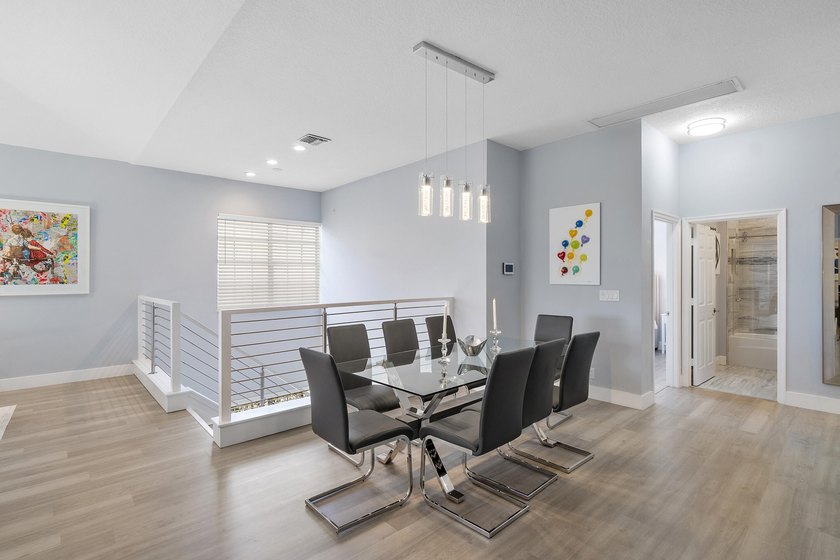 Light, open, and thoughtfully updated, this penthouse residence - photo 9