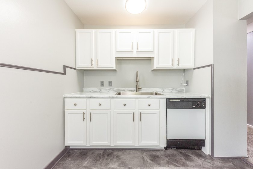Quiet tree lined street this 3BR/2BA ranch home is located in a - photo 11