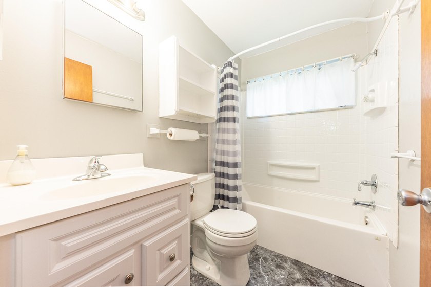 Quiet tree lined street this 3BR/2BA ranch home is located in a - photo 19