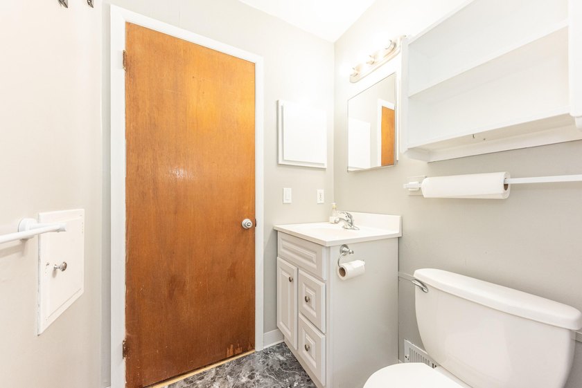 Quiet tree lined street this 3BR/2BA ranch home is located in a - photo 20