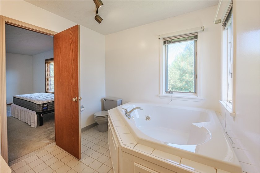 Welcome to this pristine colonial home located in Webster. There - photo 30