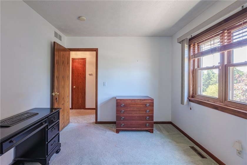 Welcome to this pristine colonial home located in Webster. There - photo 35