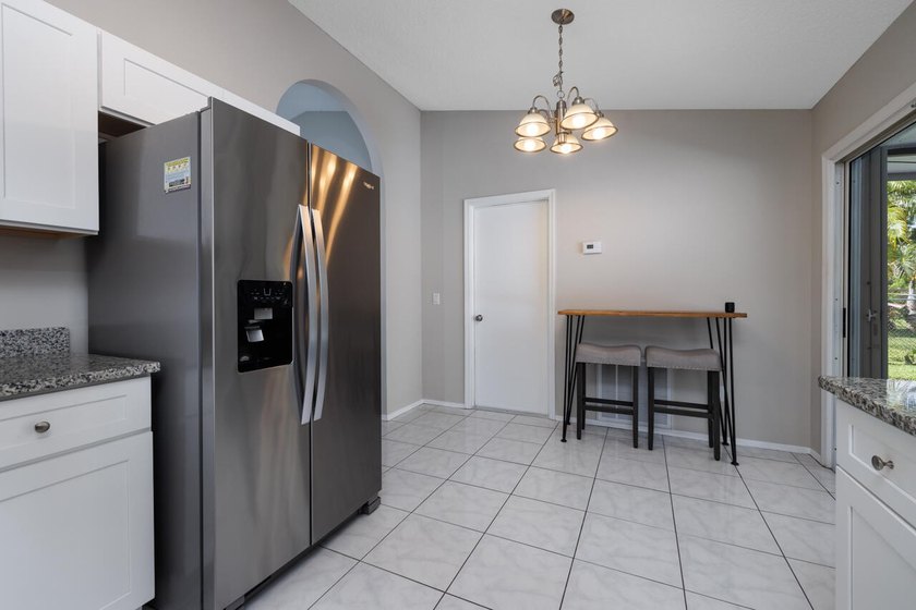 Welcome to this meticulously maintained 3-bedroom 3-bath pool - photo 10