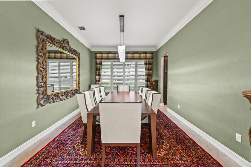 Welcome to this exceptional two-story estate in the exclusive - photo 14