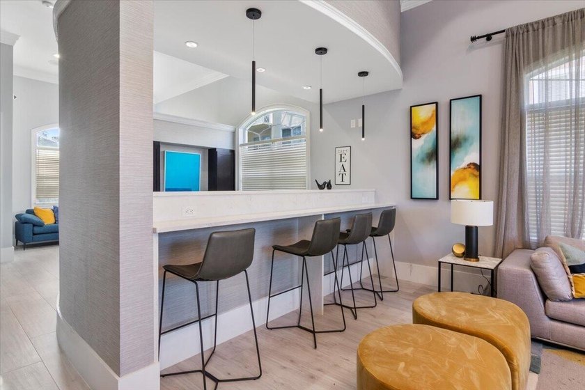 Simply Stunning!! Sought after and rarely available 3 bed 2 bath - photo 3