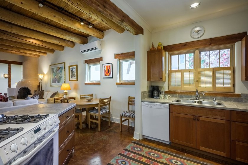 OPEN, LIGHT-FILLED SINGLE-LEVEL CONDOMINIUM IN THE HIGHLY - photo 13