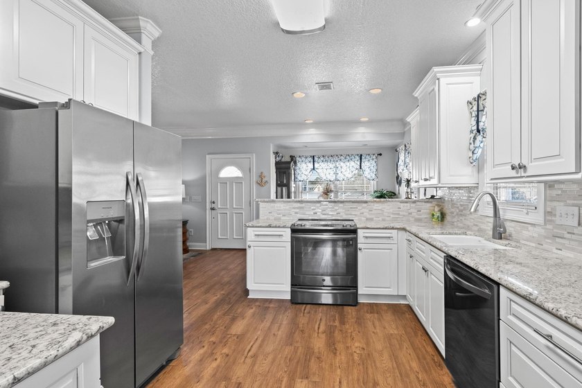CUSTOM BUILT OCEAN VIEW RAISED BEACH HOUSE WITH HUGE WRAPAROUND - photo 31