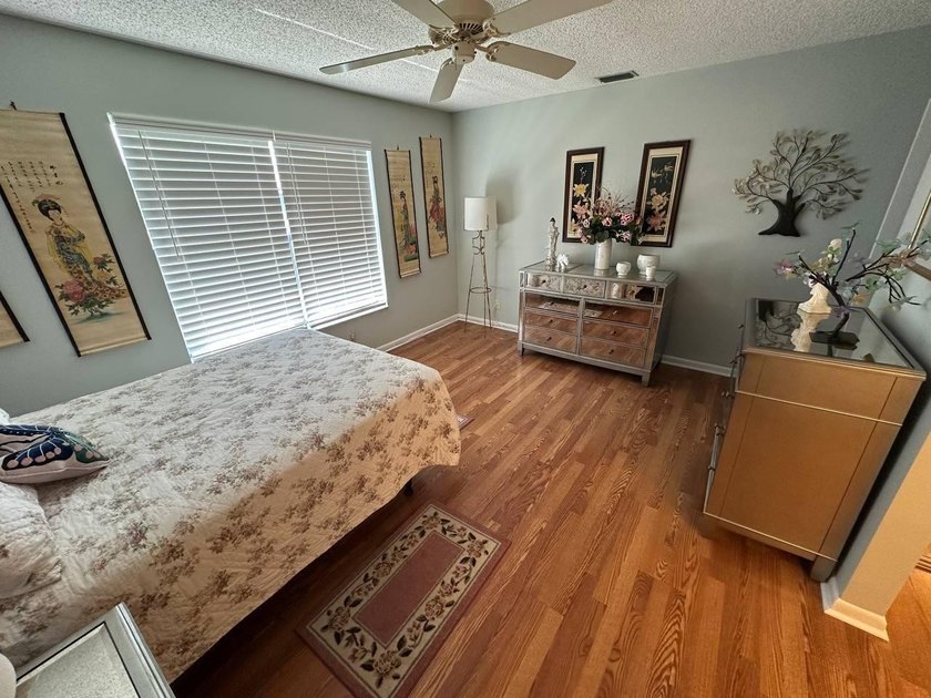 Discover this beautifully maintained condominium in the heart of - photo 12