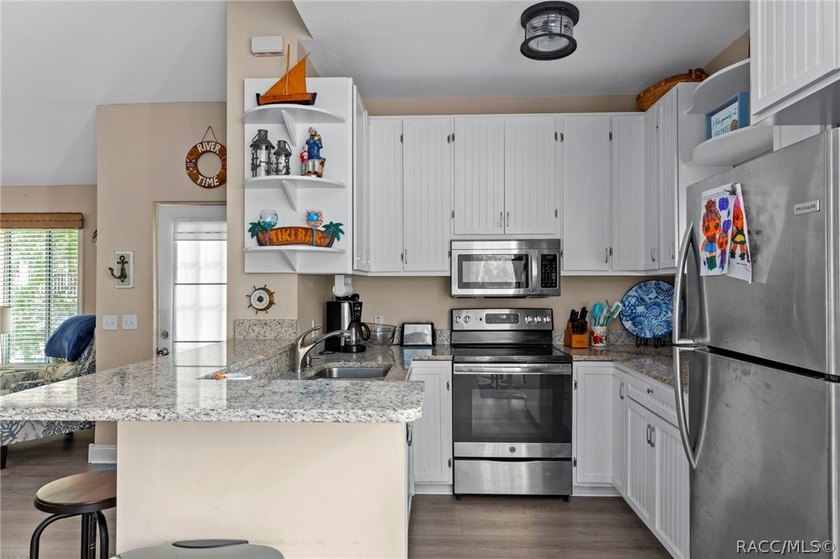Enjoy the best of Florida waterfront living in this elevated - photo 5