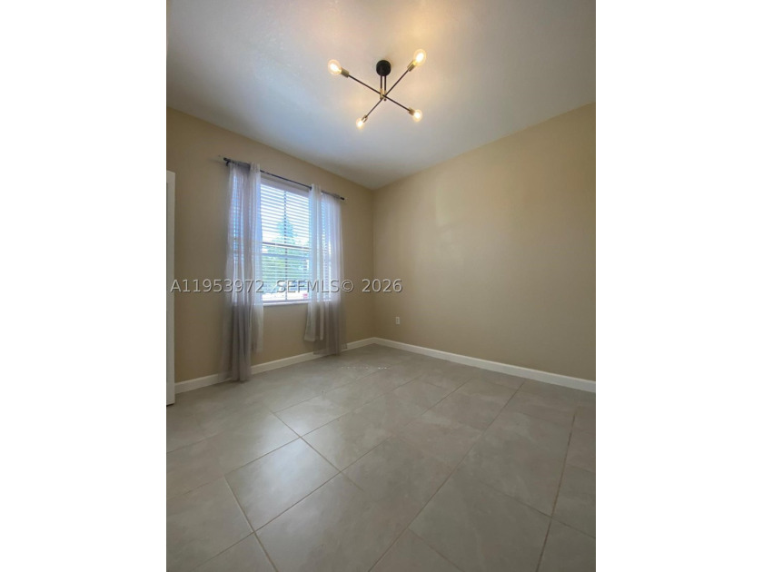 Welcome to this stunning 3-bedroom, 3-bathroom home in the - photo 2