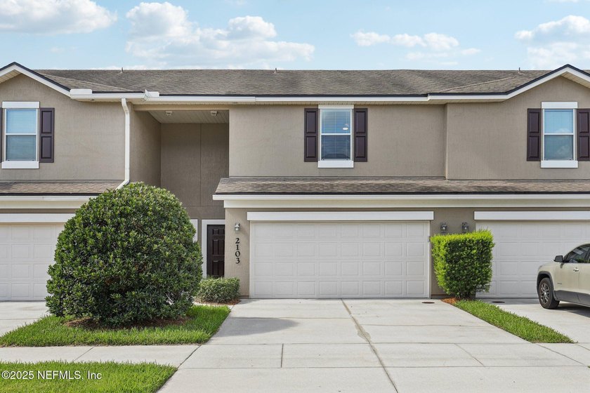 This townhome offers 2 bedrooms, 2.5 baths, and 1,667 sq ft in - photo 3